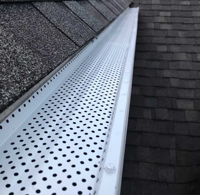 Gutter protection installed on seamless gutters