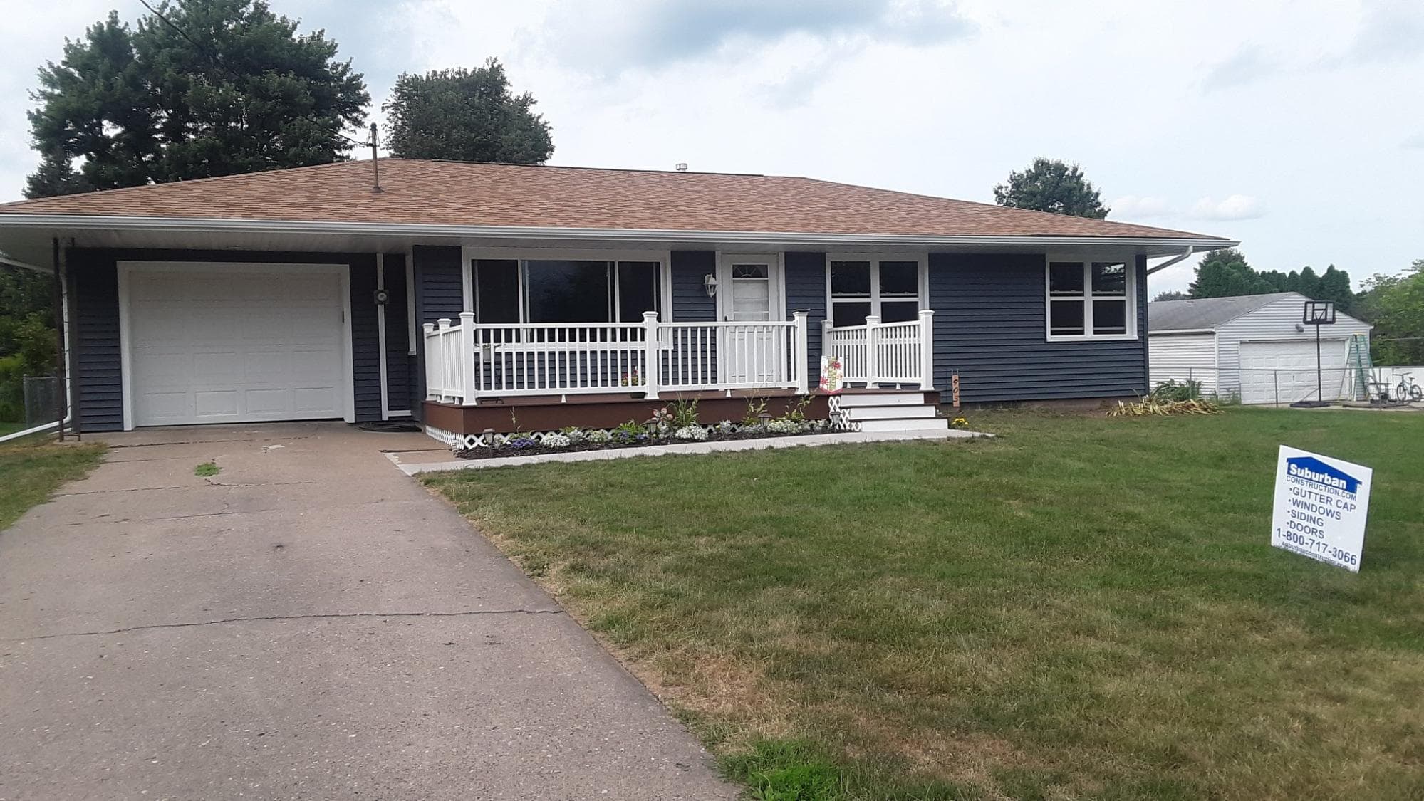 Vinyl siding installation in progress in Iowa